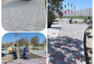 عملیات اجرای سنگ فرش و زیبا سازی رفیوژ بلوار شهدا شهر طاقانک در حال انجام است .